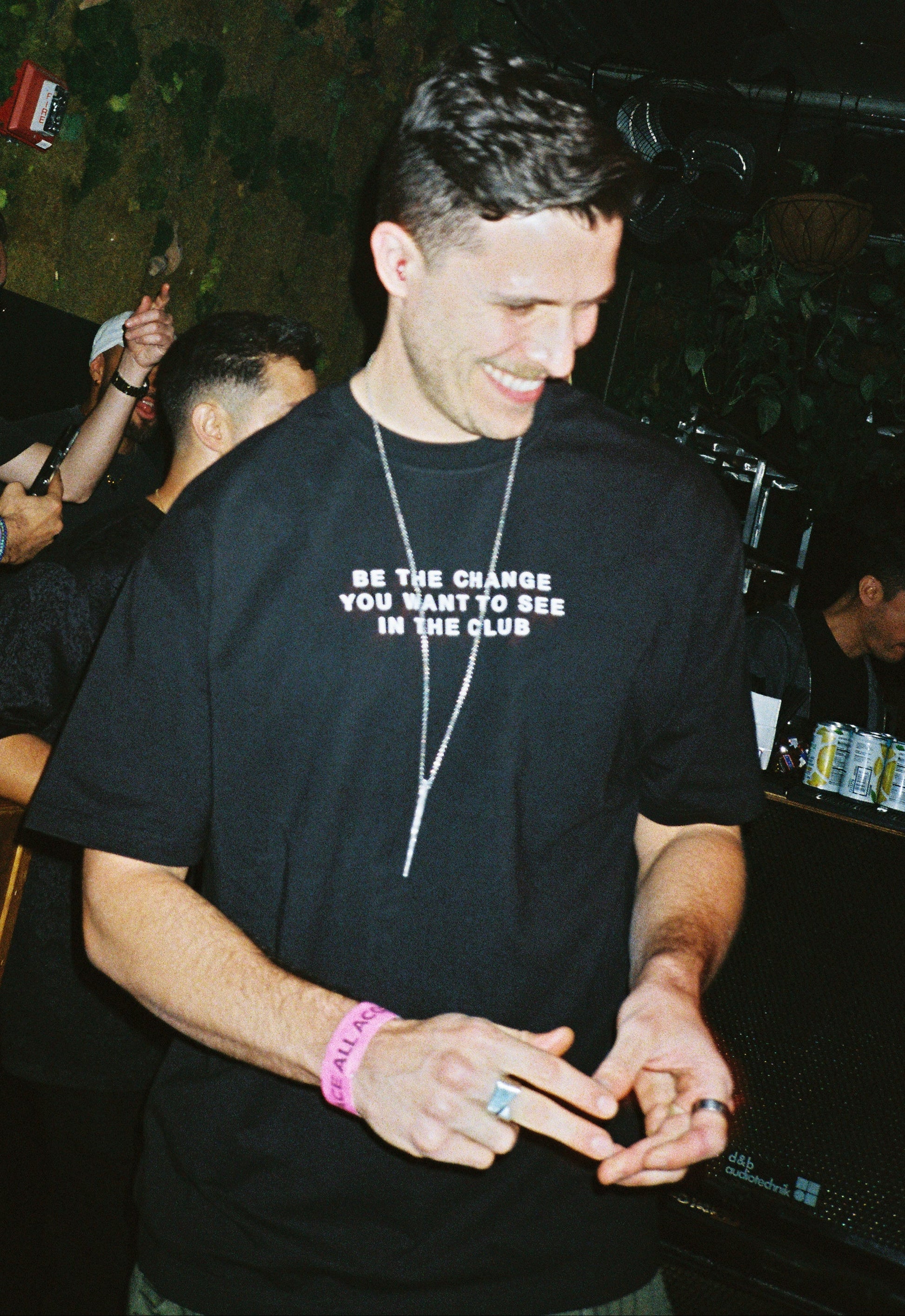 Enamour at Space Miami wearing the BE THE CHANGE shirt
